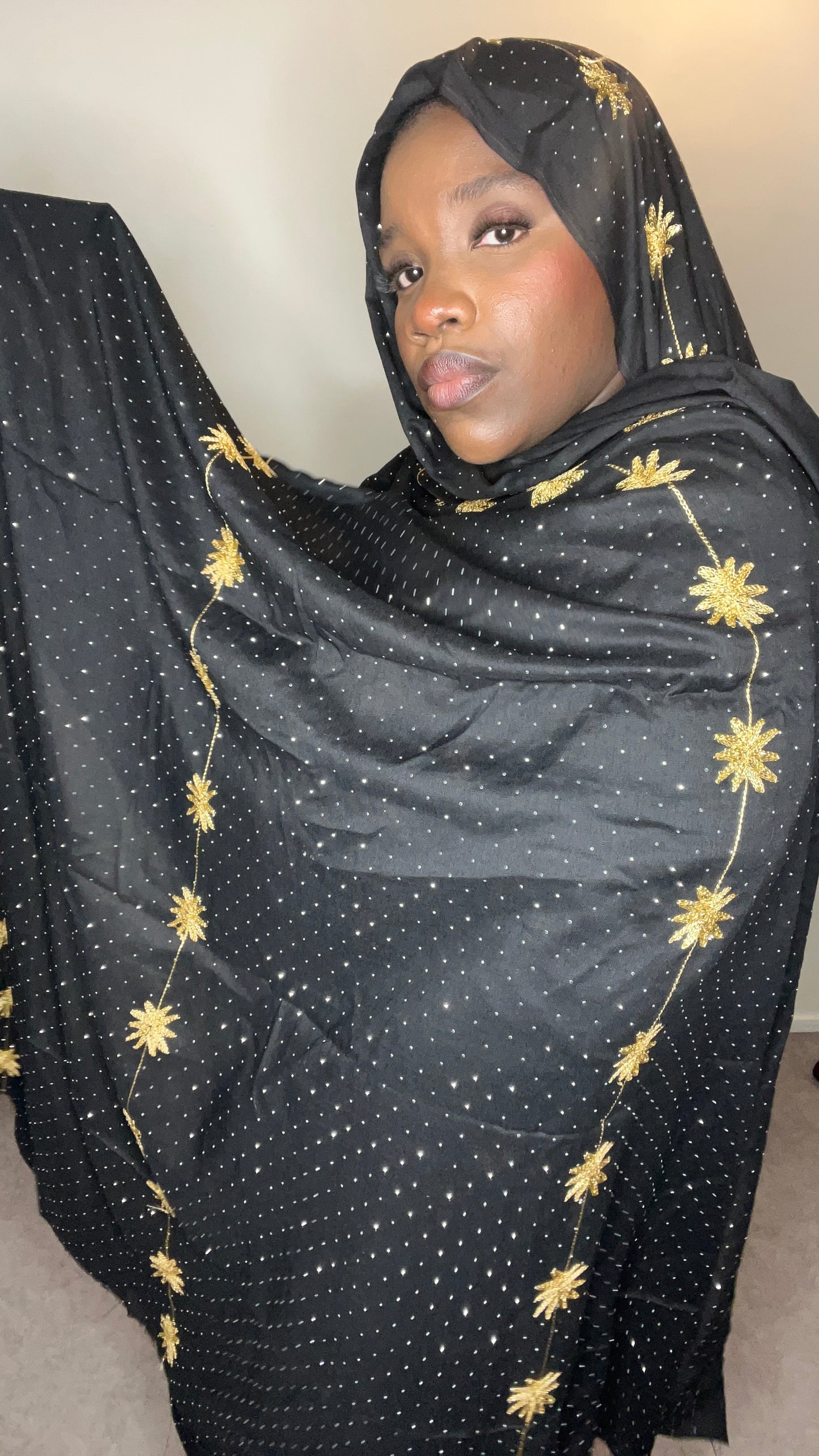 Dampe noir a motif avec strass et broderie